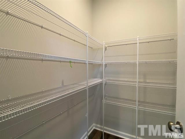 632 Gimari Drive Wake Forest, NC 27587 - Photo 17 of 18 a view of a room with racks on the wall