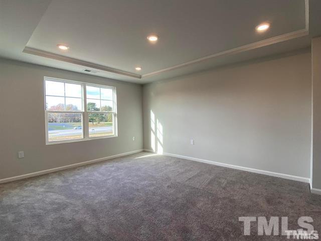 632 Gimari Drive Wake Forest, NC 27587 - Photo 9 of 18 an empty room with windows and closet
