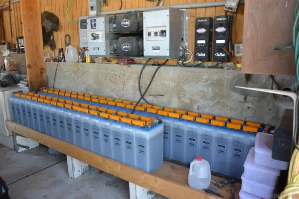 a view of a house with a snow in the background