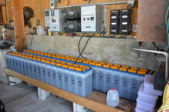 a view of a house with a snow in the background