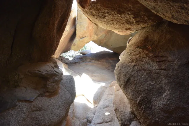 a view of a chairs and table in a yard