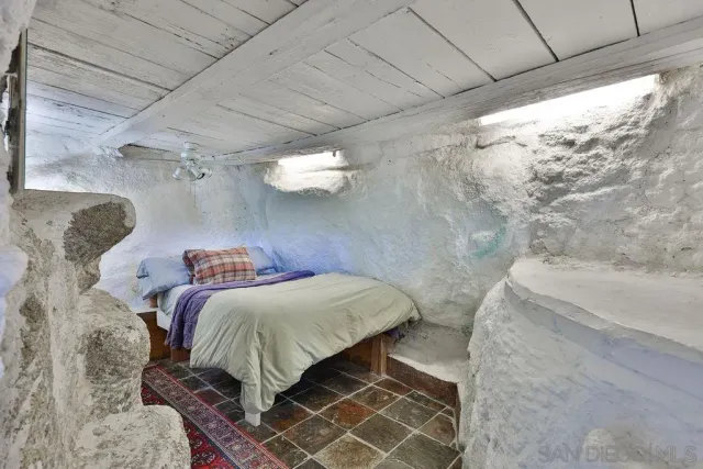 a view of a backyard with large trees