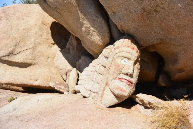 a view of a city with mountains in the background