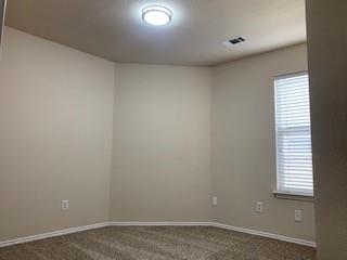 6421 Geneva Lane Fort Worth, TX 76131 - Photo 13 of 18 an empty room with a window