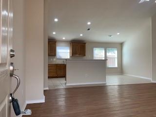 6421 Geneva Lane Fort Worth, TX 76131 - Photo 18 of 18 a view of a kitchen with a sink and a large window