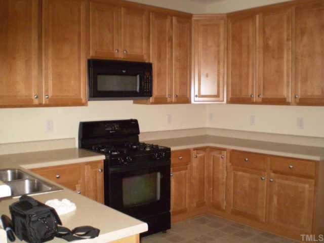 3216 Queensland Road Raleigh, NC 27614 - Photo 7 of 12 large kitchen with lots of cabinets & pantry