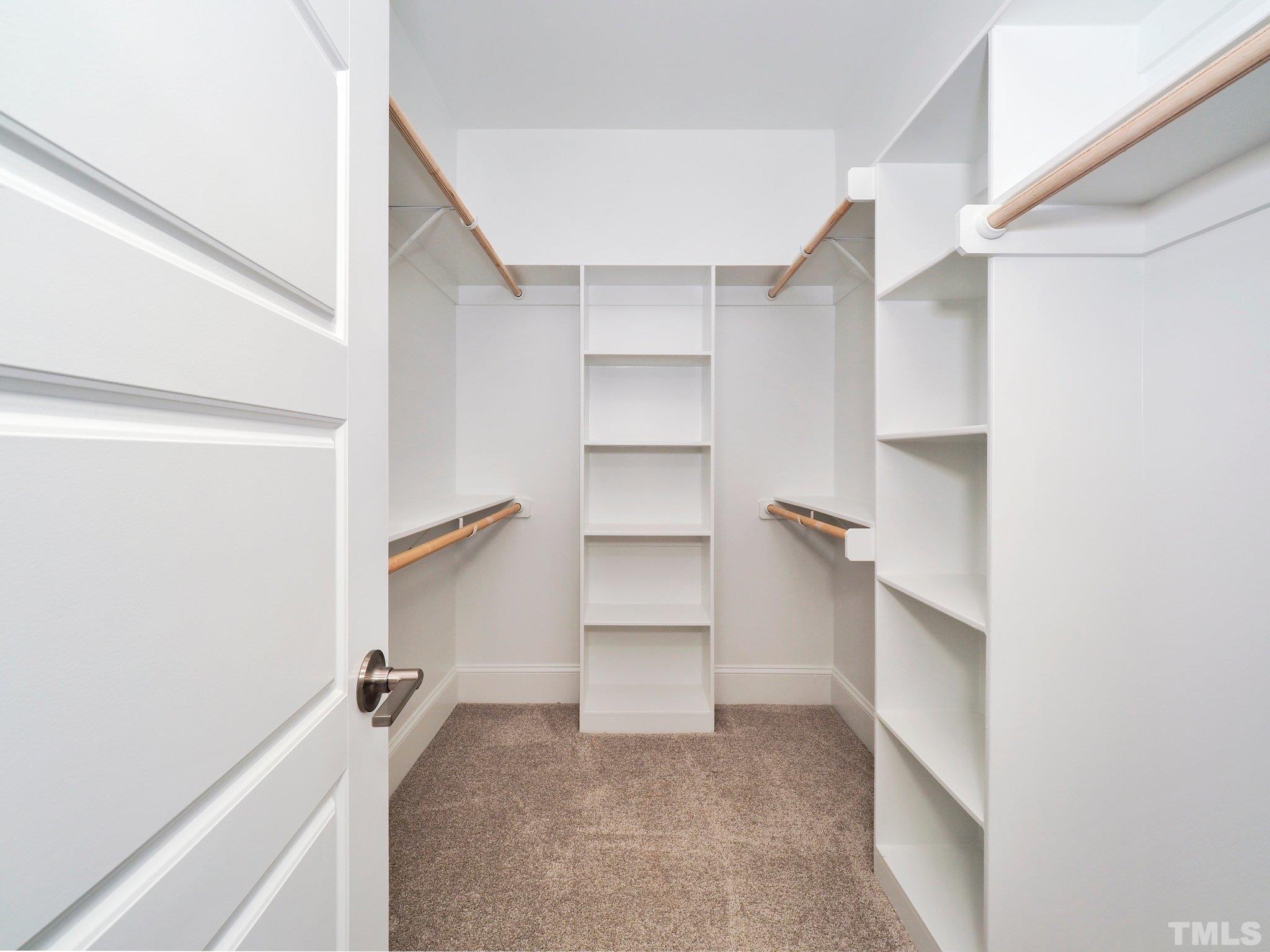 4924 Trek Lane Raleigh, NC 27606 - Photo 20 of 24 a view of an empty walk in closet