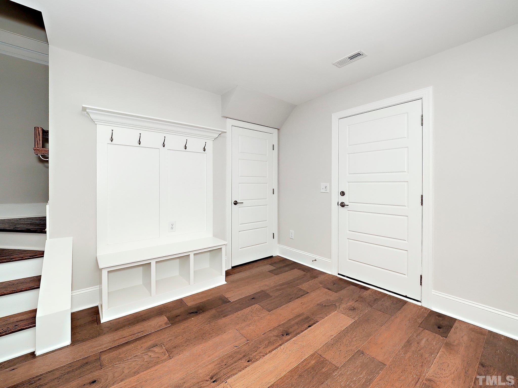 4924 Trek Lane Raleigh, NC 27606 - Photo 24 of 24 an empty room with wooden floor