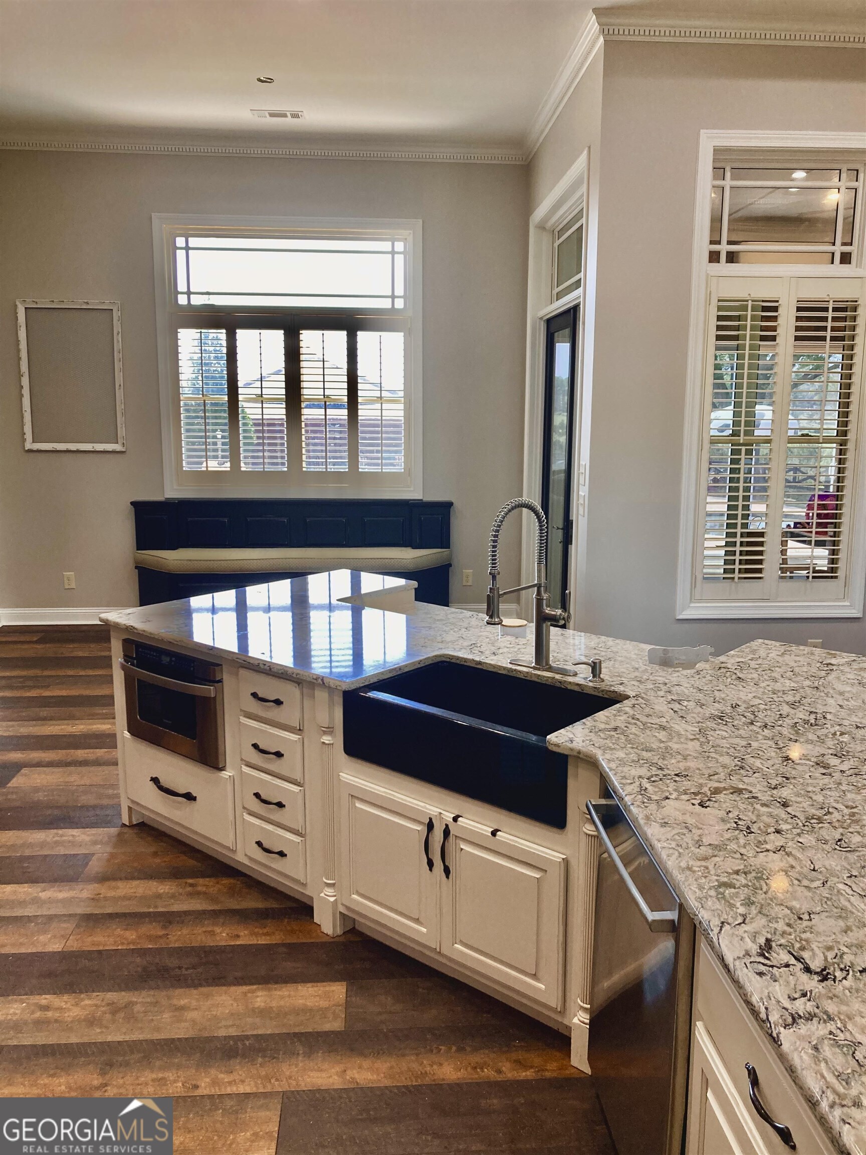 243 Ralls Road Hogansville, GA 30230 - Photo 11 of 39 a kitchen with a stove and a window