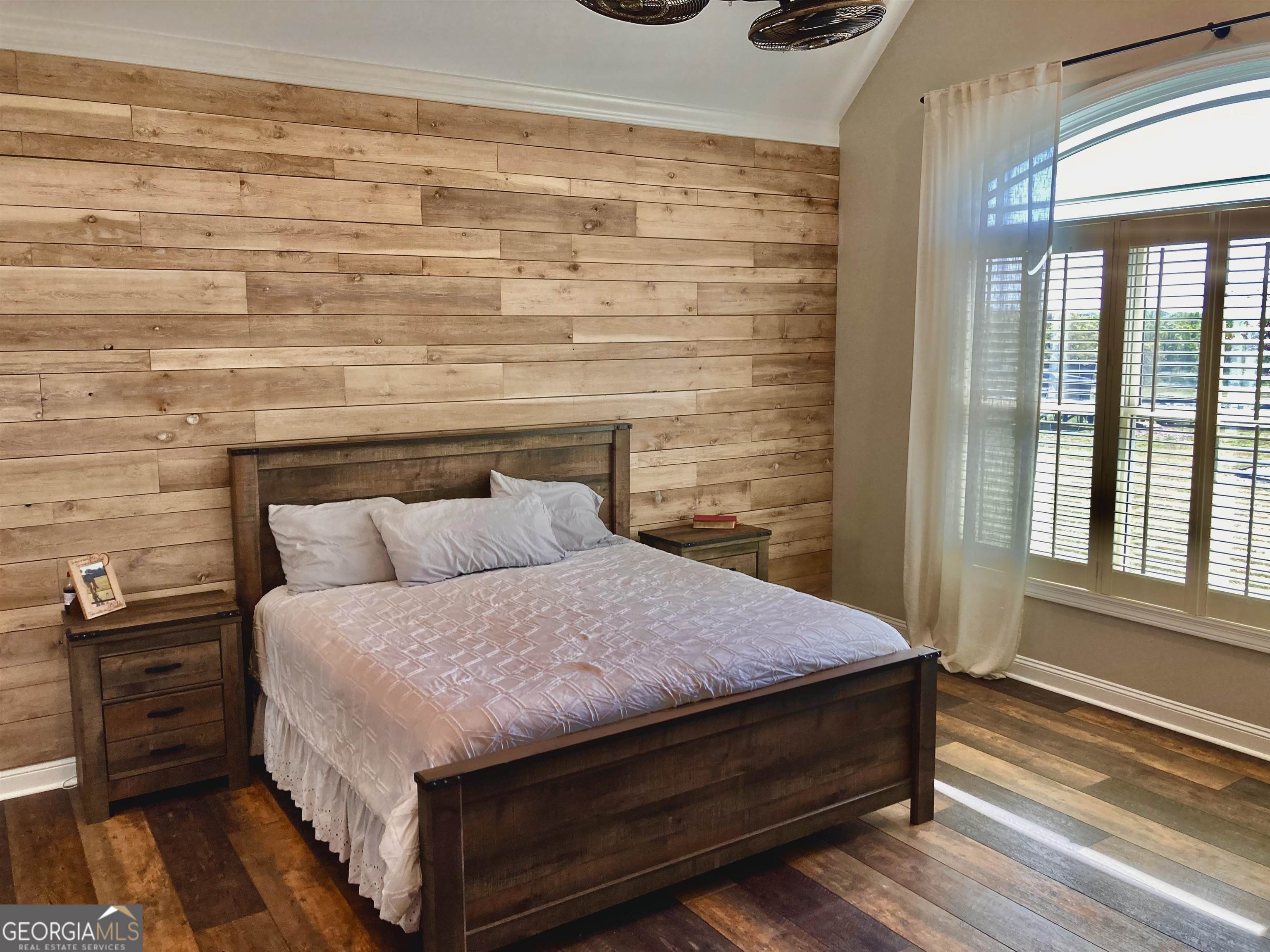 243 Ralls Road Hogansville, GA 30230 - Photo 14 of 39 a bedroom with a bed and wooden floor