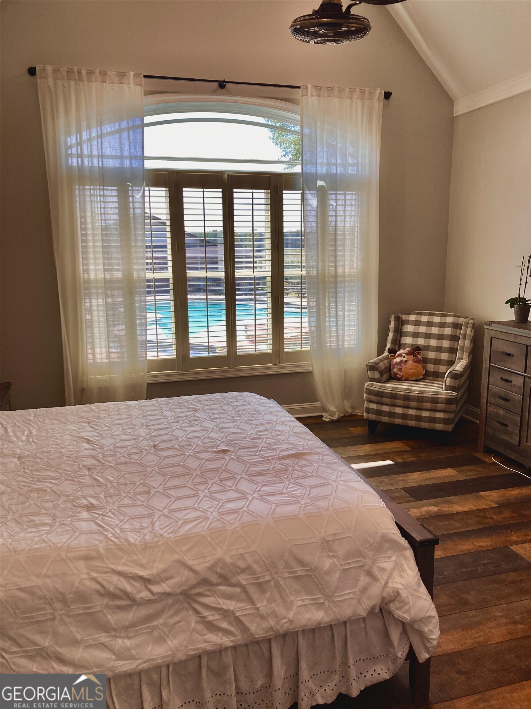 243 Ralls Road Hogansville, GA 30230 - Photo 15 of 39 a bedroom with a bed and wooden floor