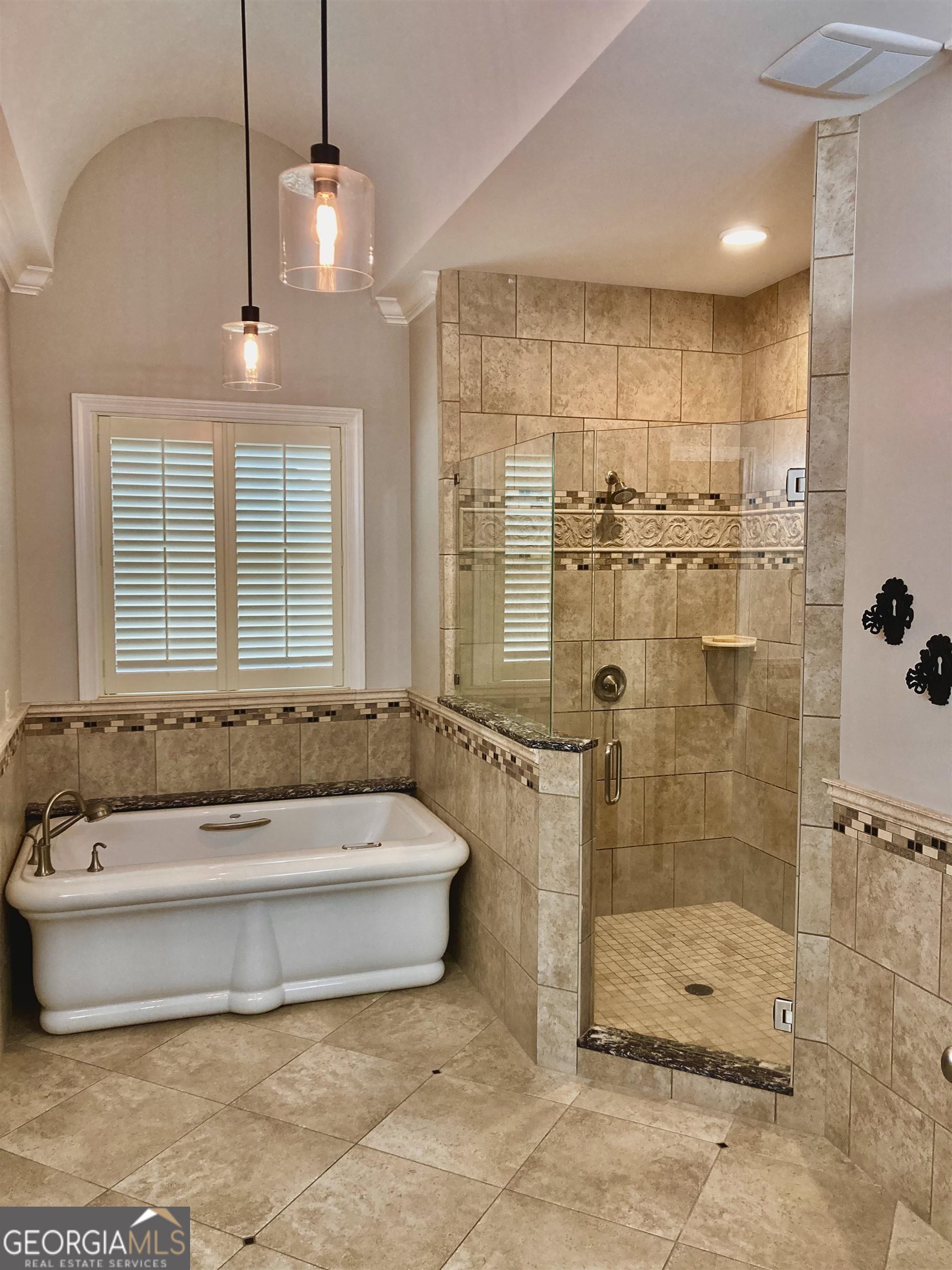 243 Ralls Road Hogansville, GA 30230 - Photo 16 of 39 a bathroom with a bathtub and a shower