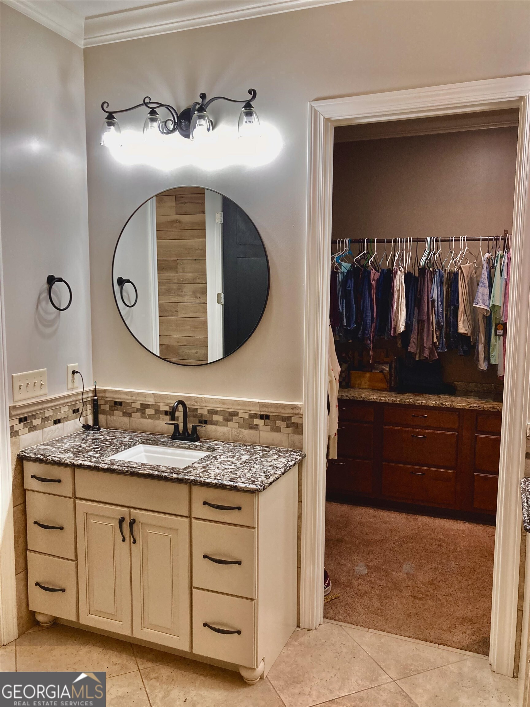 243 Ralls Road Hogansville, GA 30230 - Photo 17 of 39 a bathroom with a sink and a mirror