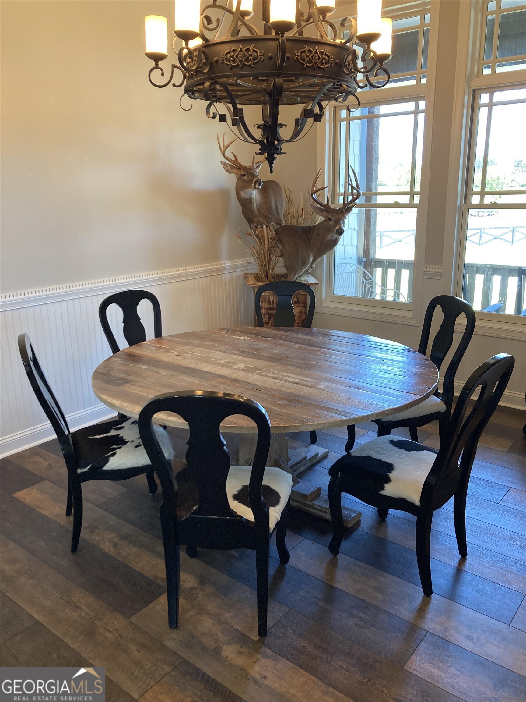 243 Ralls Road Hogansville, GA 30230 - Photo 20 of 39 a view of a dining room with furniture window and wooden floor
