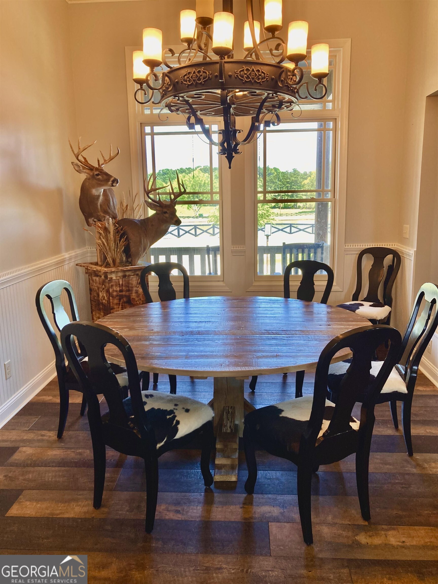 243 Ralls Road Hogansville, GA 30230 - Photo 21 of 39 a view of a dining room with furniture window and wooden floor