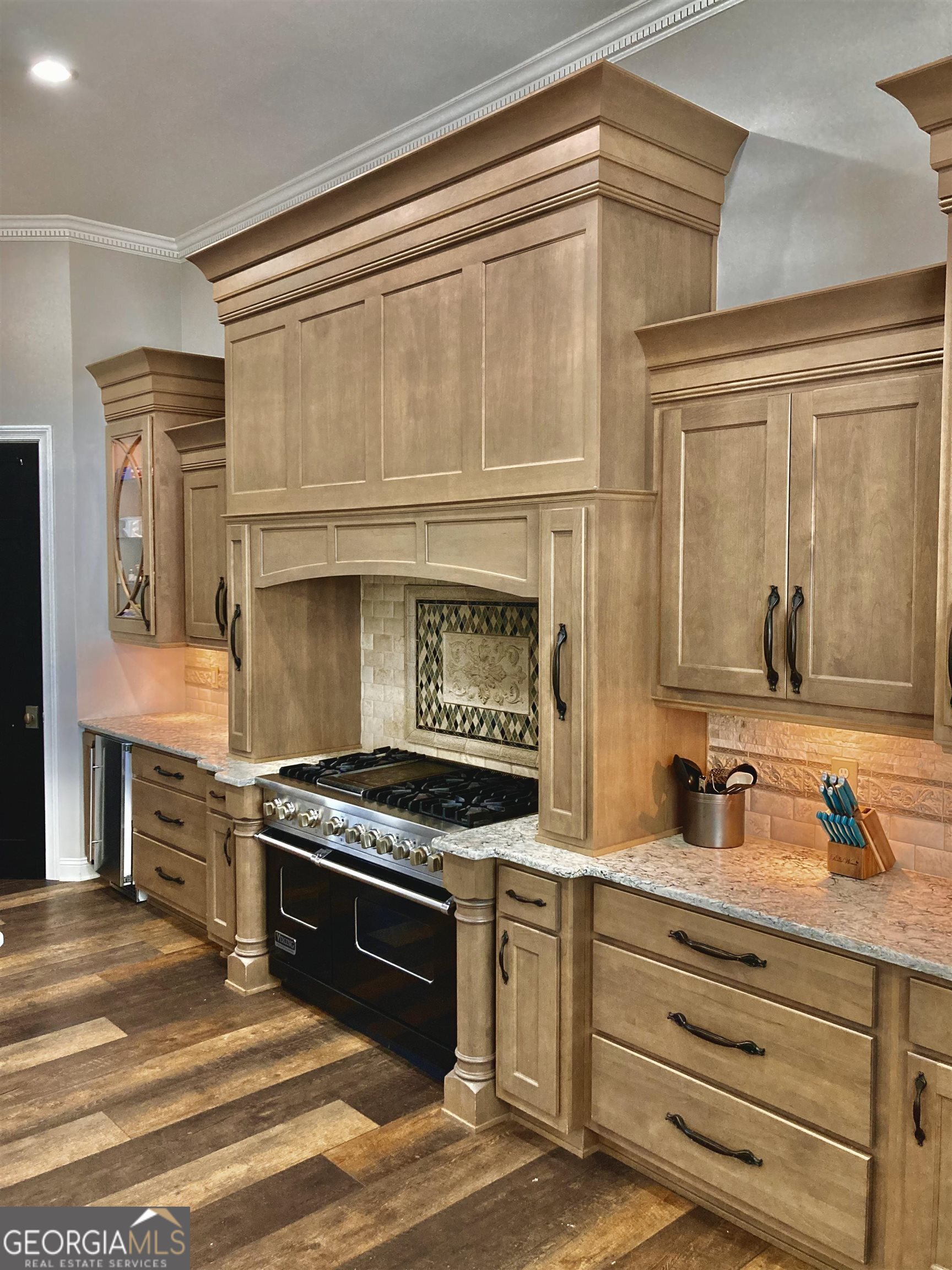 243 Ralls Road Hogansville, GA 30230 - Photo 9 of 39 a kitchen with granite countertop a stove and a sink