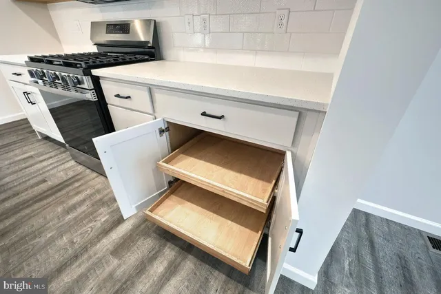 a utility room with washer and dryer