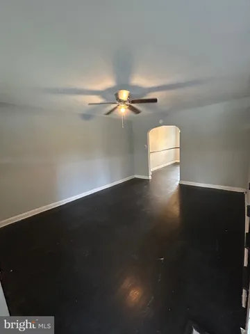 a view of a room has wooden floor