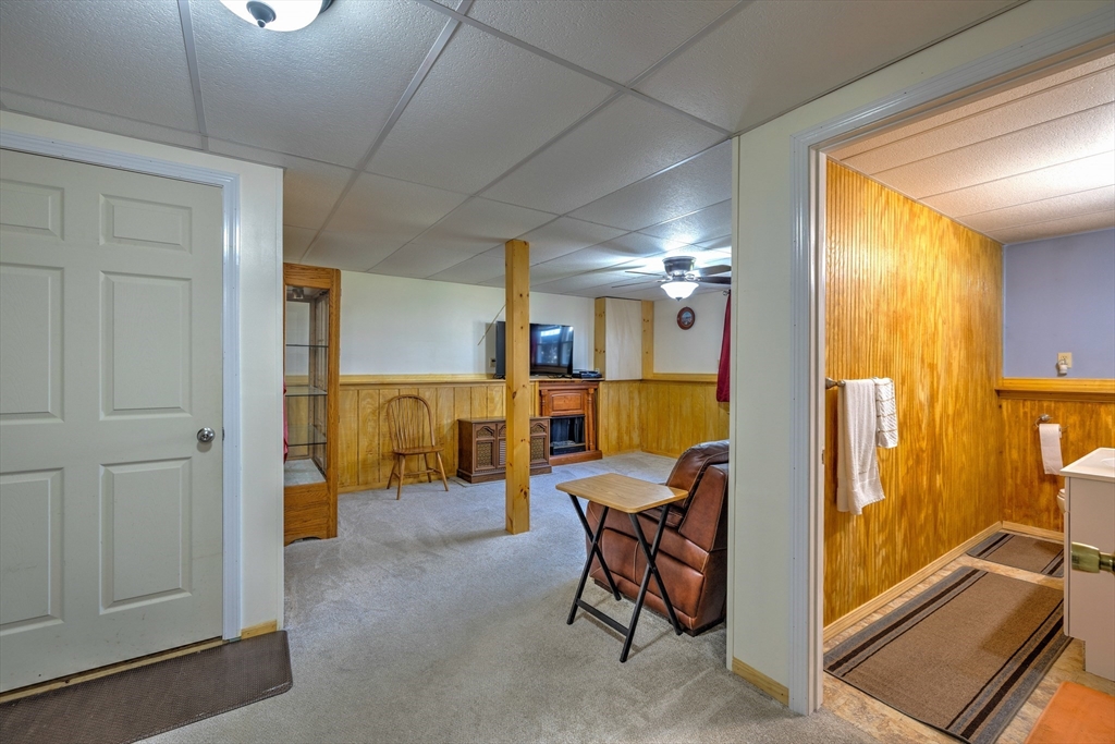 84 Long Hill Road Brookfield, MA 01506 - Photo 21 of 42 a view of a dining area with furniture and a chandelier