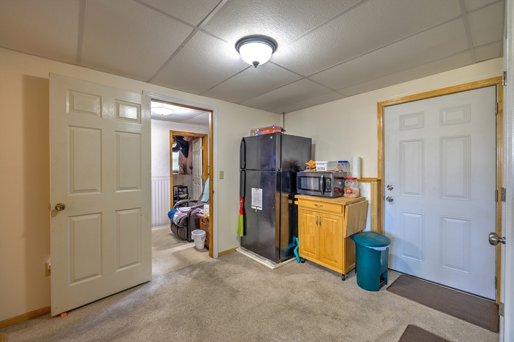 84 Long Hill Road Brookfield, MA 01506 - Photo 25 of 42 a kitchen with refrigerator and sink