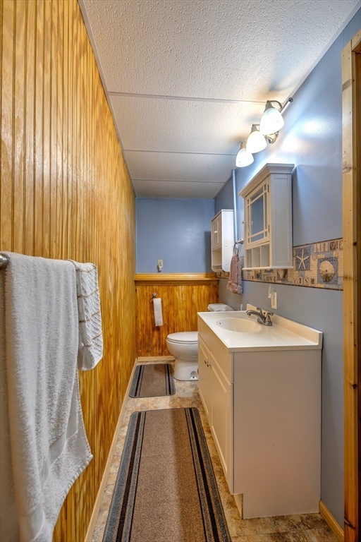 84 Long Hill Road Brookfield, MA 01506 - Photo 26 of 42 a spacious bathroom with a sink a mirror and a bathtub