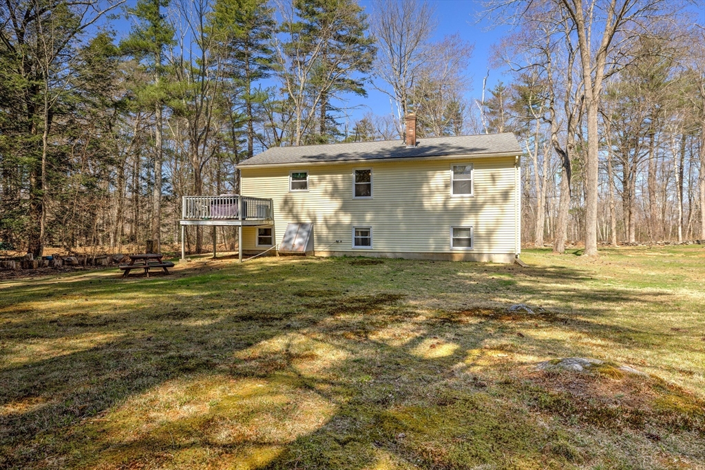 84 Long Hill Road Brookfield, MA 01506 - Photo 30 of 42 a view of a house with a yard