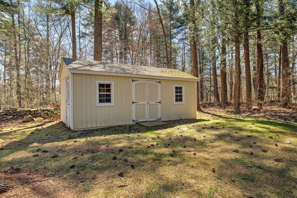 84 Long Hill Road Brookfield, MA 01506 - Photo 31 of 42 a view of a house with backyard