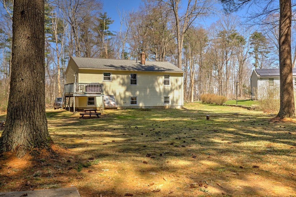84 Long Hill Road Brookfield, MA 01506 - Photo 32 of 42 a view of a town with large trees
