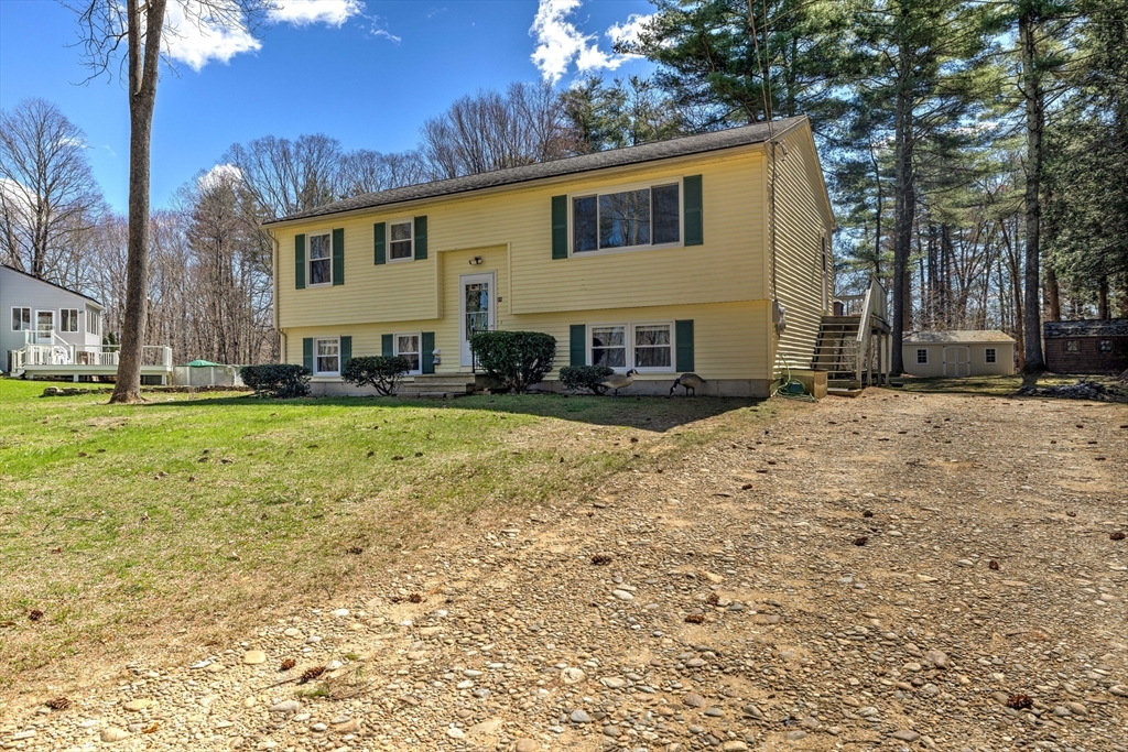 84 Long Hill Road Brookfield, MA 01506 - Photo 33 of 42 a view of a house with a yard