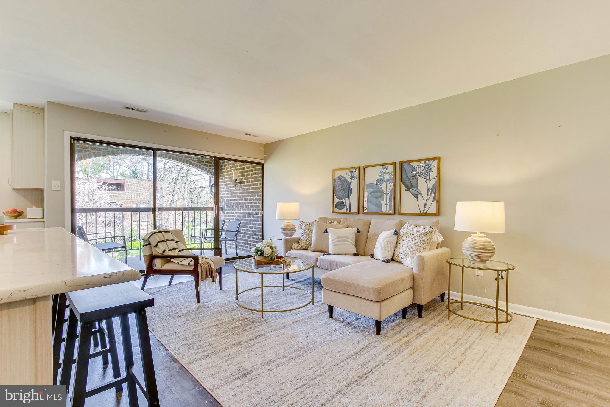 11212 Chestnut Grove Square, Unit 216 Reston, VA 20190 - Photo 15 of 31 Open Family Room