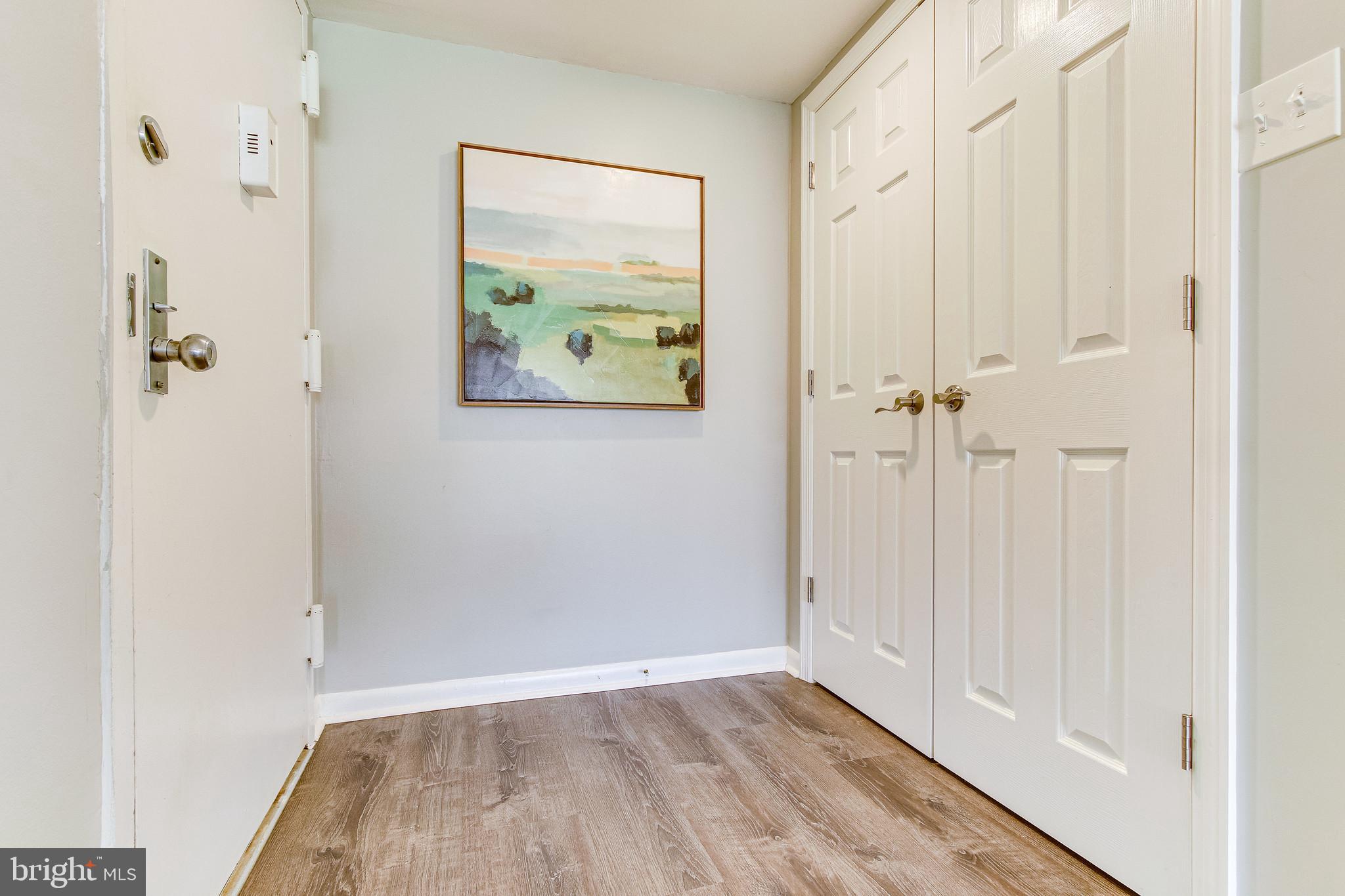 11212 Chestnut Grove Square, Unit 216 Reston, VA 20190 - Photo 6 of 31 Luxury Vinyl Plank Floors