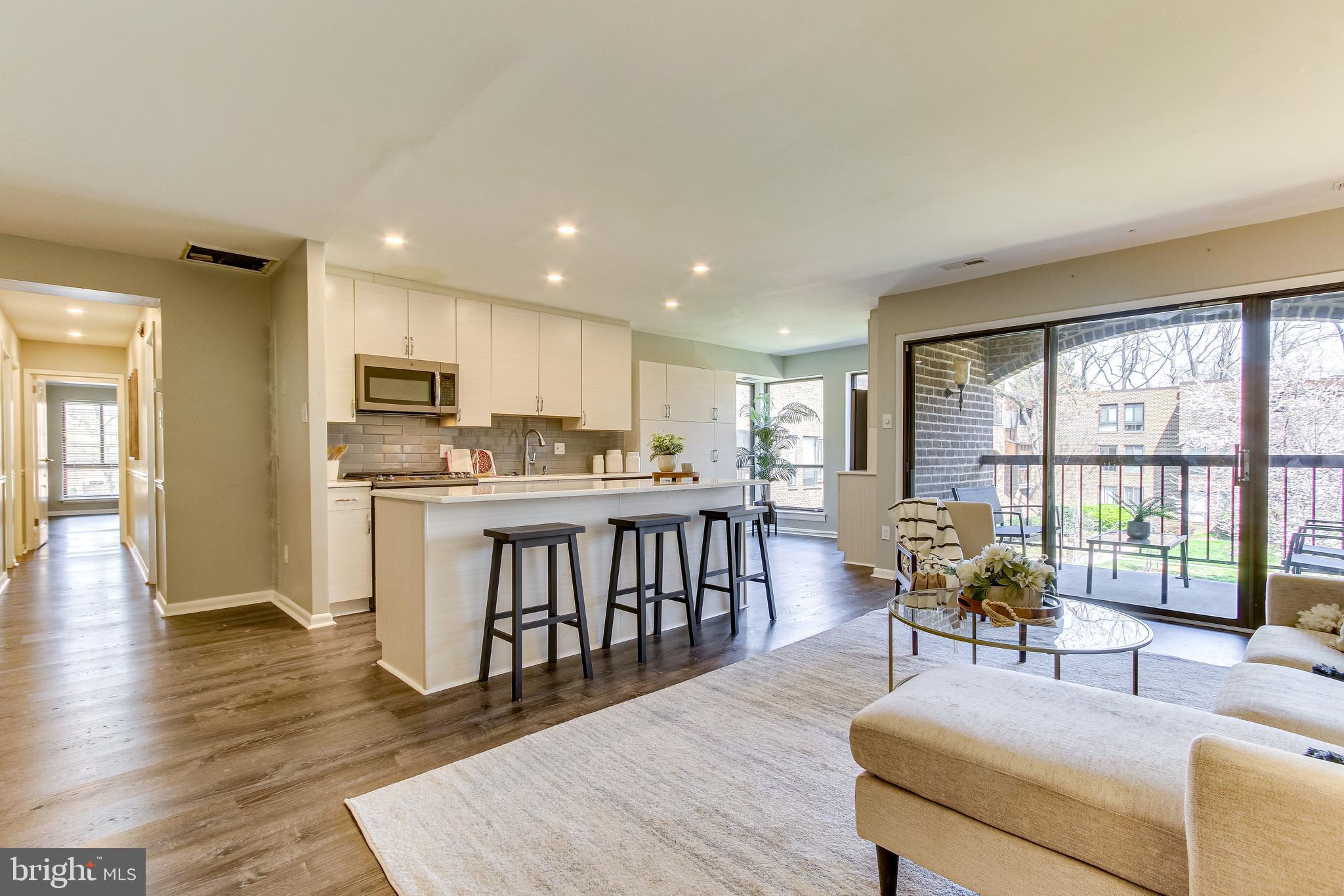 11212 Chestnut Grove Square, Unit 216 Reston, VA 20190 - Photo 7 of 31 Kitchen Opened Up to Family Room