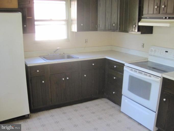 3813 Clarks Point Road Middle River, MD 21220 - Photo 4 of 6 a kitchen with a sink and a window