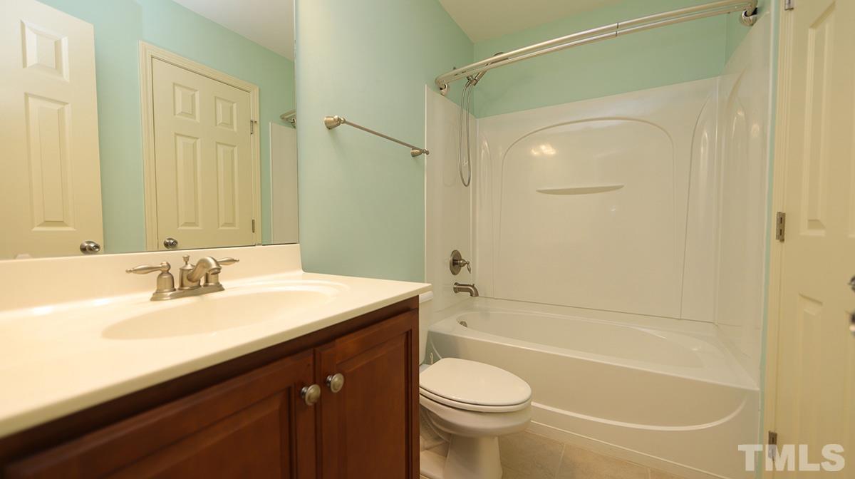 301 Dimock Way Wake Forest, NC 27587 - Photo 8 of 14 First floor full bath features tile floor