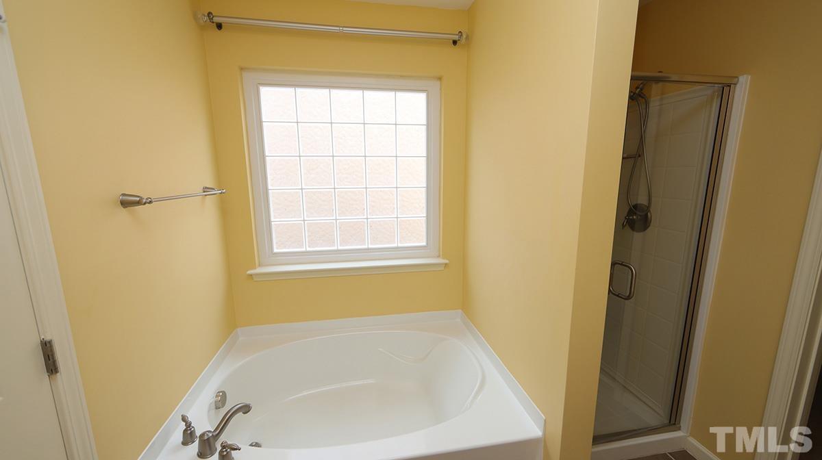 301 Dimock Way Wake Forest, NC 27587 - Photo 10 of 14 Double vanity, garden tub and separate shower.