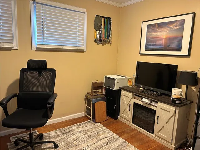 a view of workspace with lounge chair