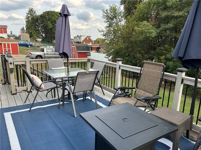 a view of a terrace with furniture