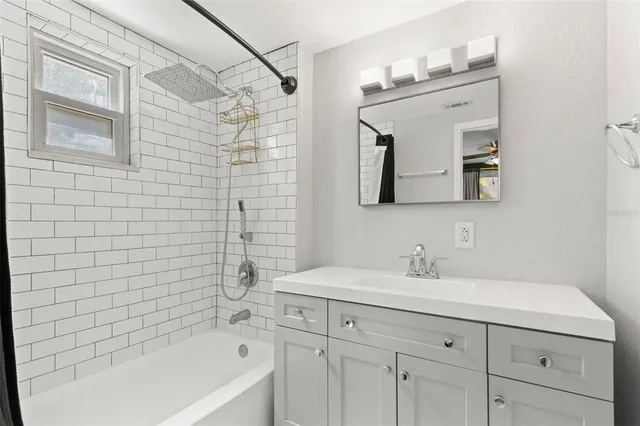 a bathroom with a sink and a bathtub