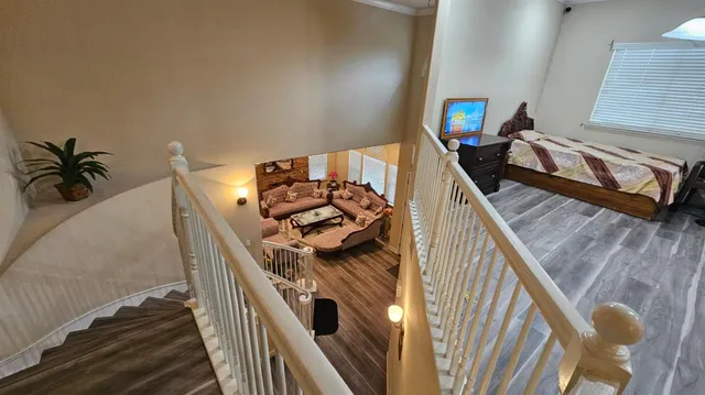 a view of a living room and furniture