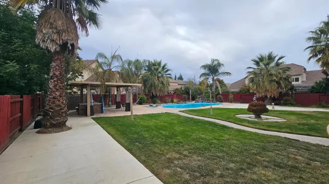 a view of a park with swings and slides