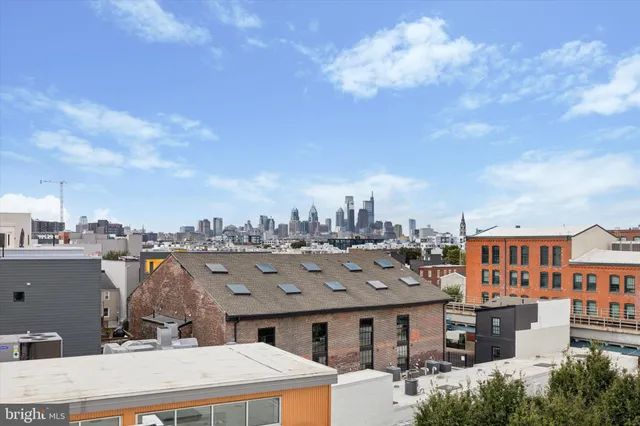 a view of a city that has tall buildings