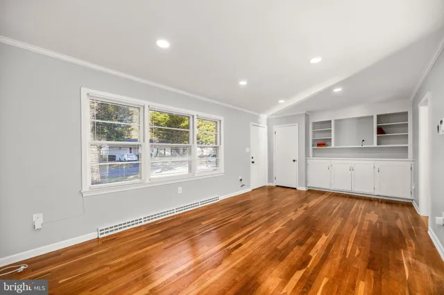 a view of a livingroom with wooden floor