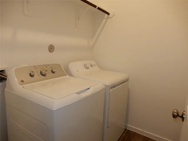 a utility room with dryer and washer