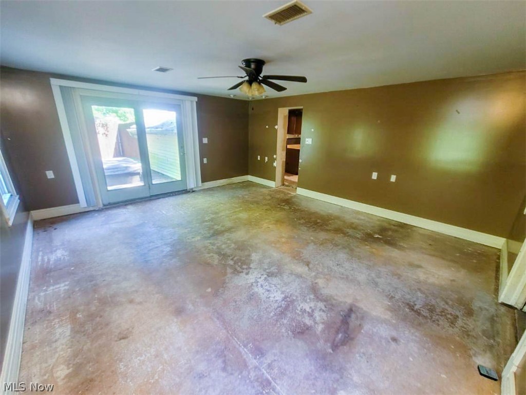 109 Harper Road Streetsboro, OH 44241 - Photo 13 of 28 Unfurnished room with concrete floors and ceiling fan