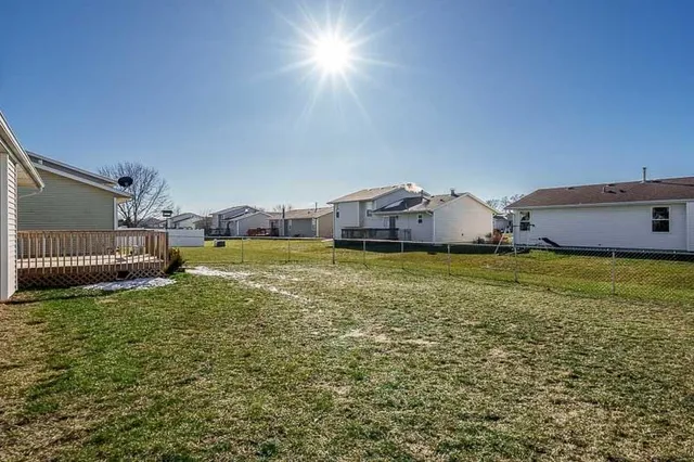 a view of a swimming pool with an outdoor space and seating area