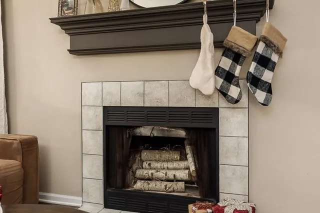 a stove top oven sitting inside of a kitchen
