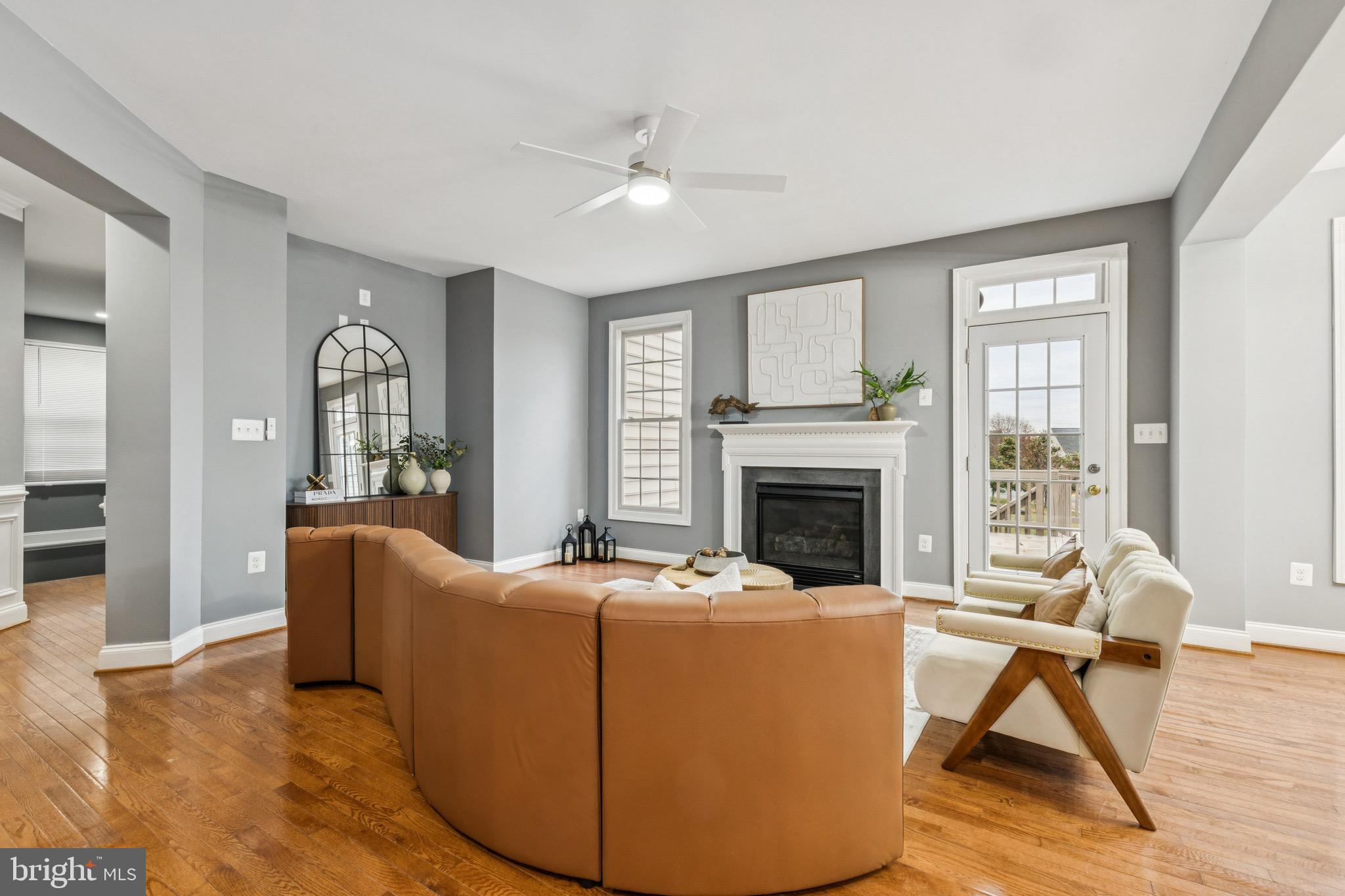 16363 Rusty Rudder Drive Woodbridge, VA 22191 - Photo 11 of 40 a living room with furniture and a fireplace