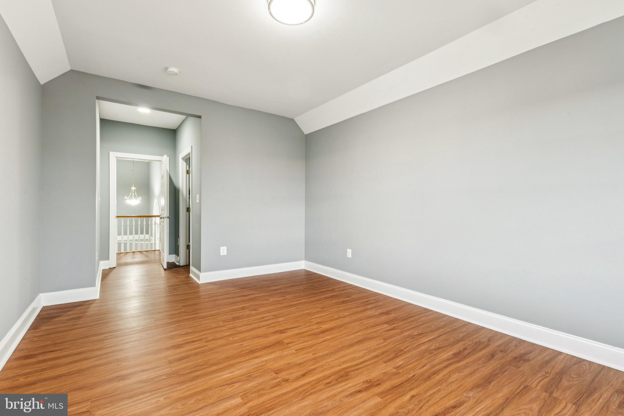 16363 Rusty Rudder Drive Woodbridge, VA 22191 - Photo 19 of 40 a view of an empty room and wooden floor