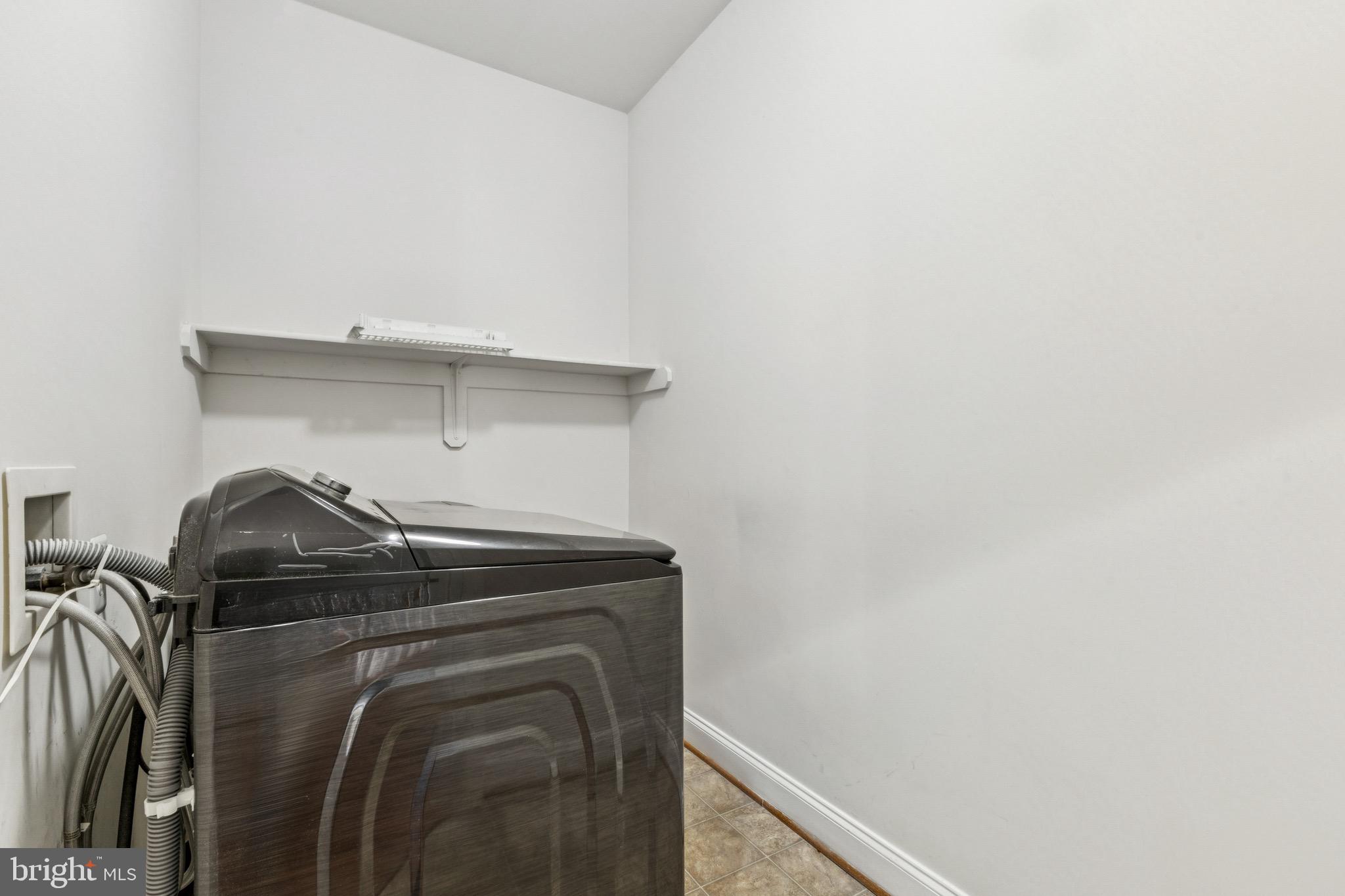 16363 Rusty Rudder Drive Woodbridge, VA 22191 - Photo 20 of 40 a utility room with dryer and washer