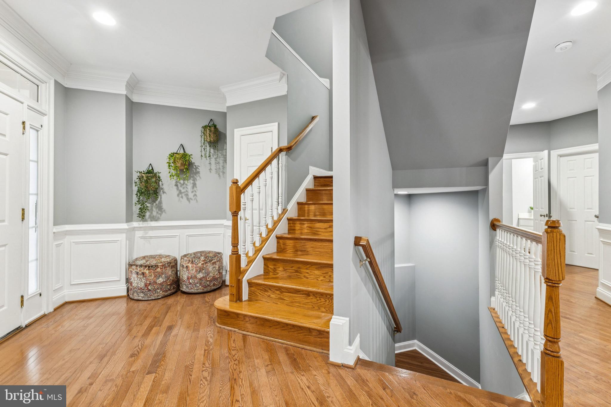 16363 Rusty Rudder Drive Woodbridge, VA 22191 - Photo 2 of 40 a view of entryway with wooden floor and stairs